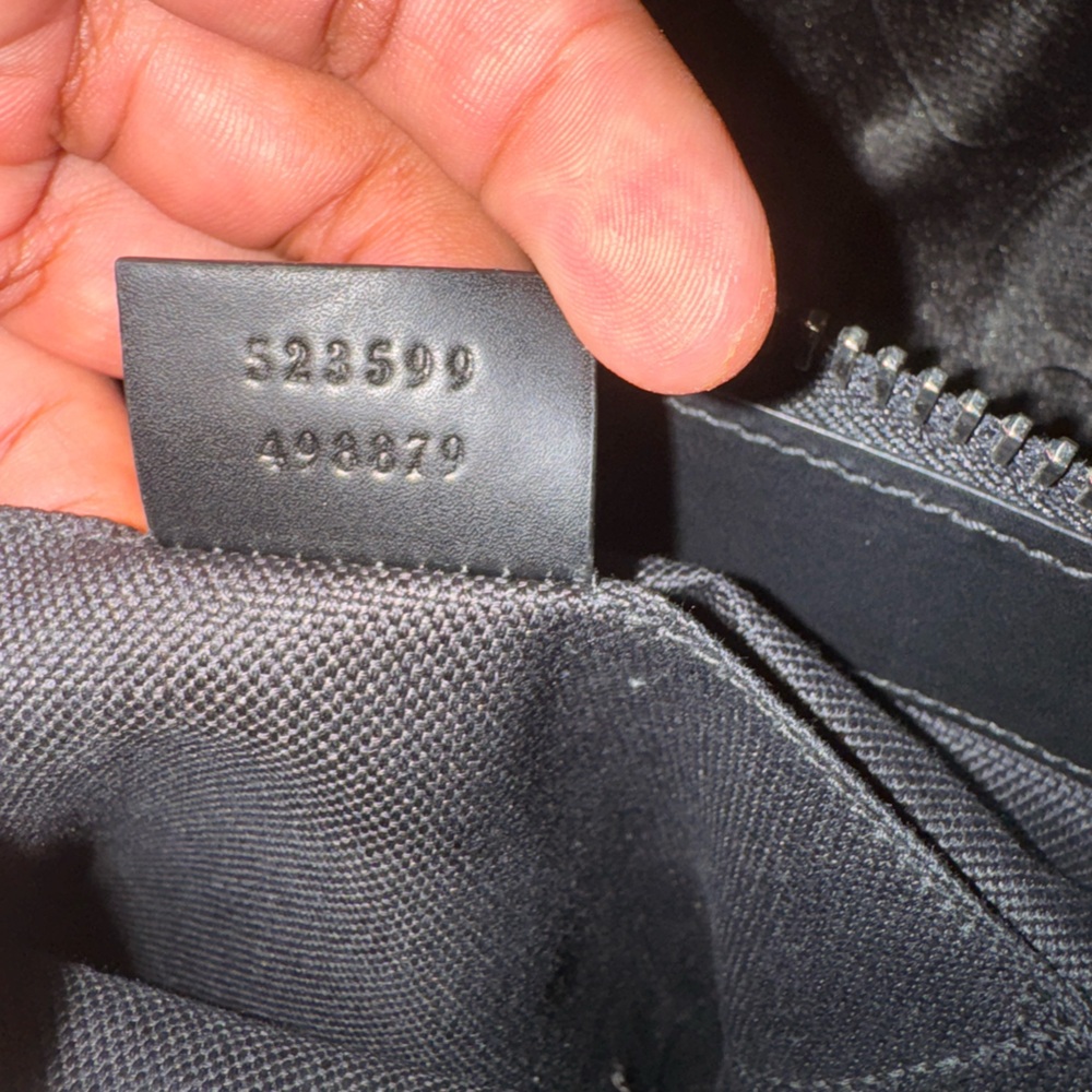 Black gucci messenger bag
